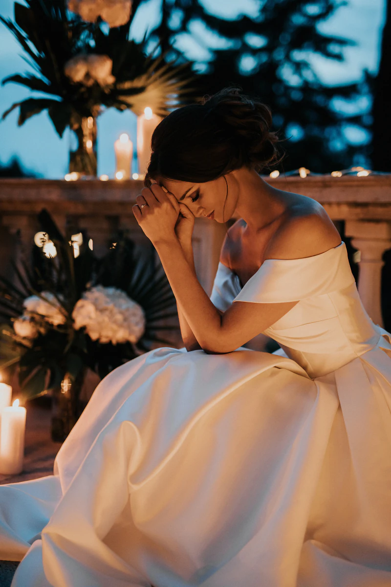 Bride by candlelight on the terrace