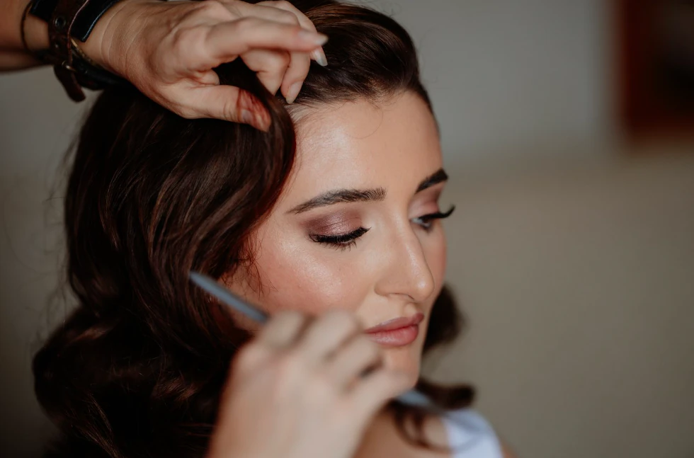 Eye makeup being applied